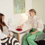 Practitioner checking pulse in the clinic - Acupuncture Pregnancy Clinic Practitioner checking pulse in the clinic
